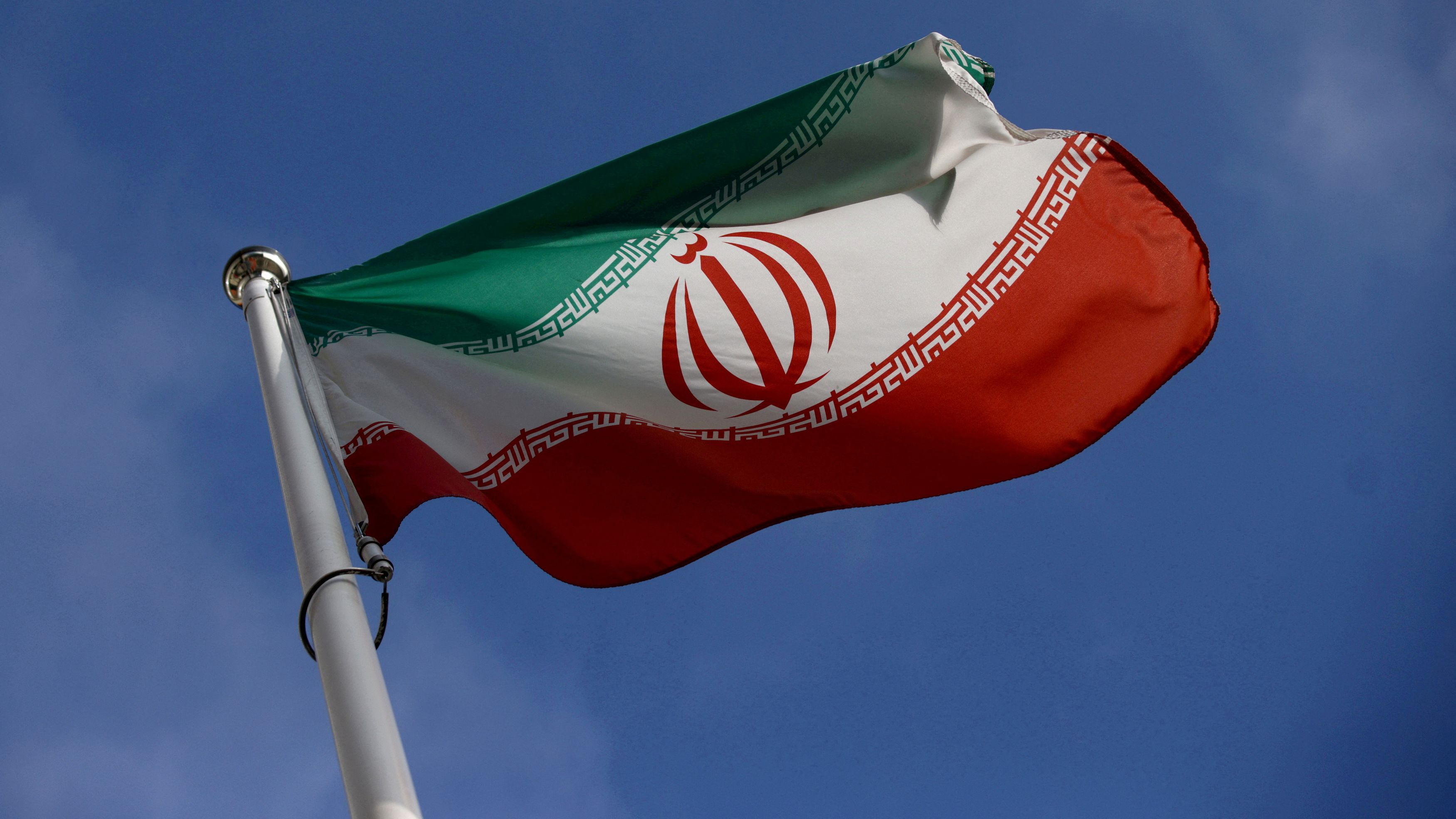 The Iranian flag waves in front of the International Atomic Energy Agency (IAEA) headquarters in Vienna, Austria, March 1, 2021. /Reuters