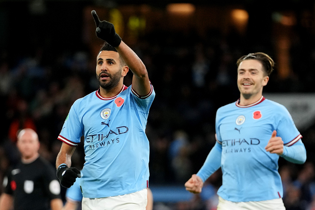 Riyad Mahrez (L) celebrates after scoring Manchester City's first goal against Chelsea during their League Cup match at Etihad Stadium in Manchester, England, November 9, 2022. /CFP