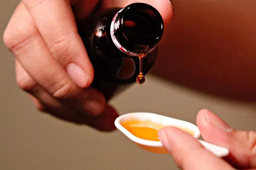 A cough medication is poured in this picture illustration taken October 19, 2022. /Reuters

