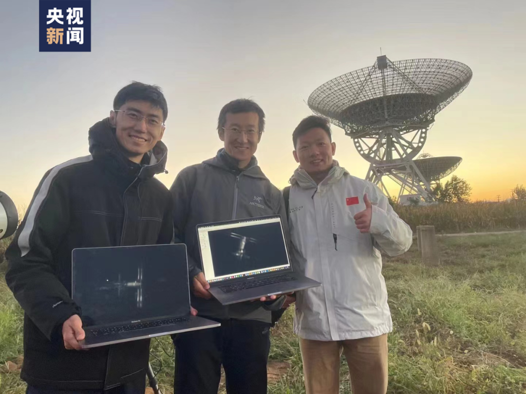 Liu Boyang (L) and his team show the China Space Station they captured next to the Miyun Observatory of the National Astronomical Observatories under Chinese Academy of Sciences. /CMG
