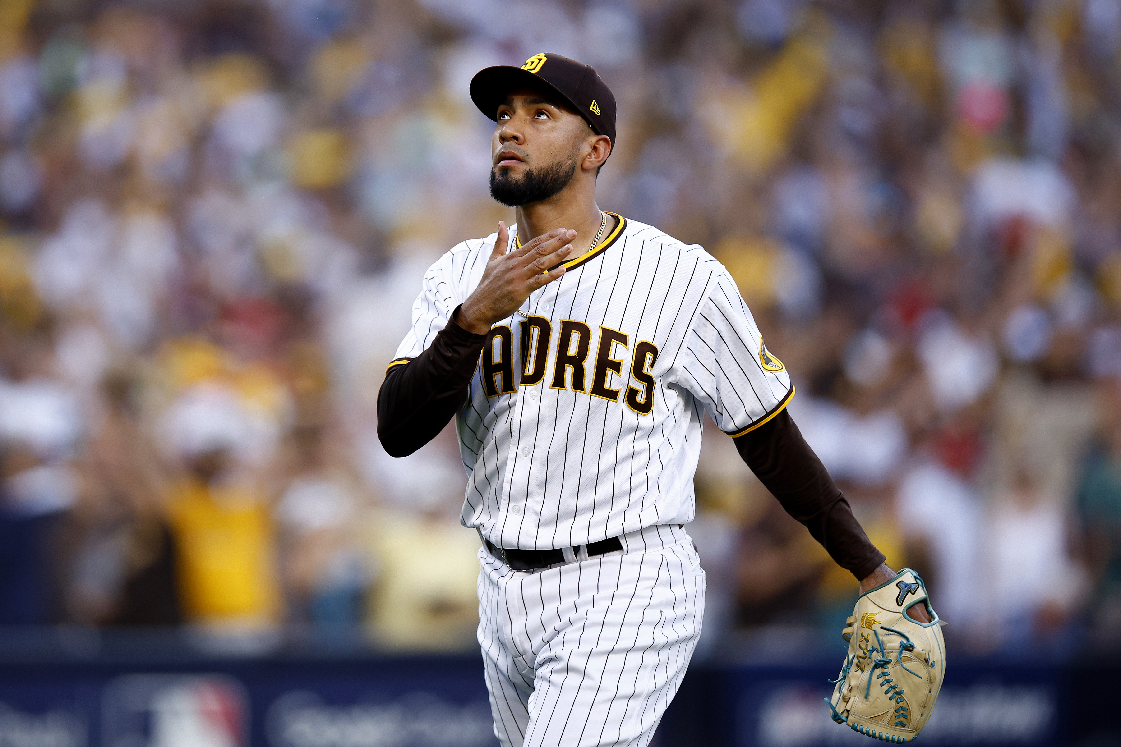 Pitcher Robert Suarez of the San Diego Padres looks on after pitching during the eighth inning in Game 2 of the National League Championship Series at PETCO Park in San Diego, California, October 19, 2022. /CFP 
