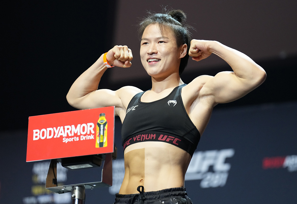 Zhang Weili of China poses on the scale during the UFC 281 ceremonial weigh-in at Radio City Music Hall in New York City, November 11, 2022. /CFP 