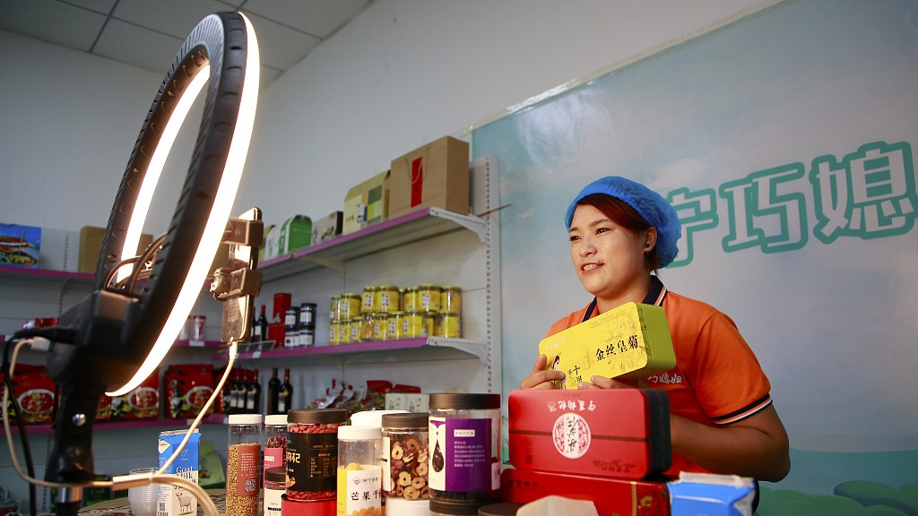 A staff member sells products via livestream e-commerce in northwest China’s Ningxia Hui Autonomous Region, September 11, 2021. /CFP