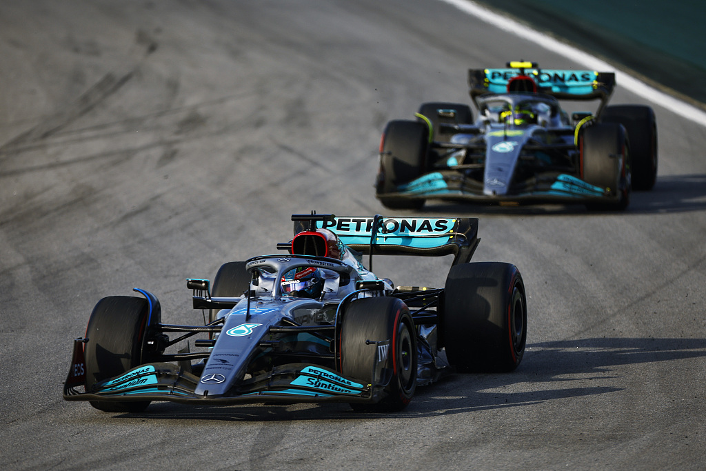 George Russell driving the (#63) Mercedes race car (L) leads teammate Lewis Hamilton on track during the Sprint race ahead of the F1 Grand Prix of Brazil in Sao Paulo, Brazil, November 12, 2022. /CFP 