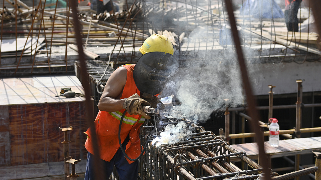 A worker in a PPP project construction site, Chongqing, China, August 3, 2022. /CFP