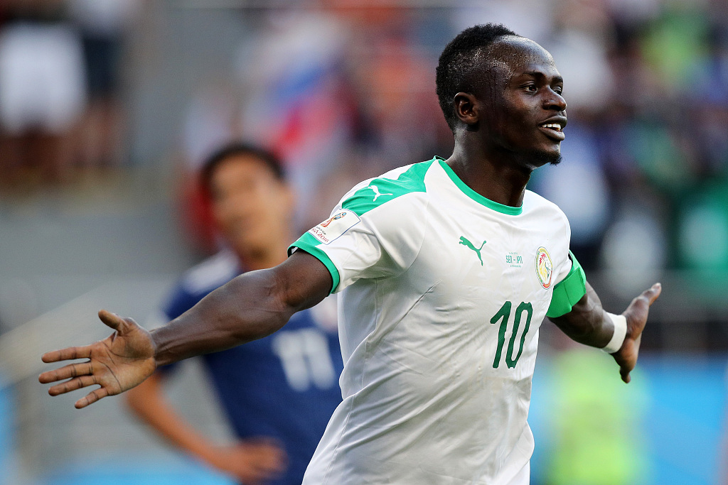 Sadio Mane of Senegal celebrates after scoring his team's first goal during their World Cup group clash with Japan at Ekaterinburg Arena in Yekaterinburg, Russia, June 24, 2018. /CFP