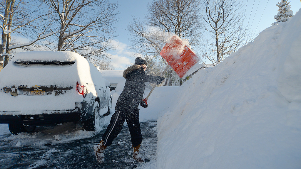 Massive snowfall buries cars and keeps falling in western NY