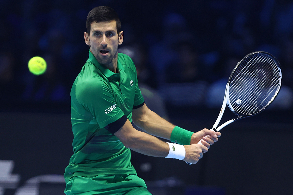 Novak Djokovic of Serbia aims at the ball during the ATP Tour Finals in Turin, Italy, November 20, 2022. /CFP