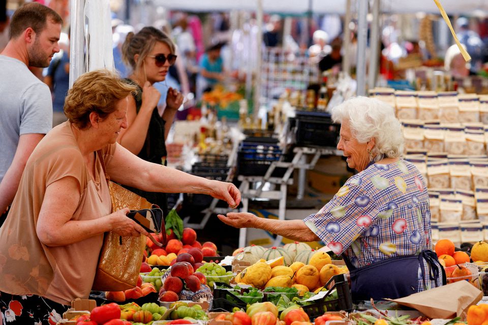 A woman shops at Campo de' Fiori market in Rome, Italy, June 15, 2022. /Reuters