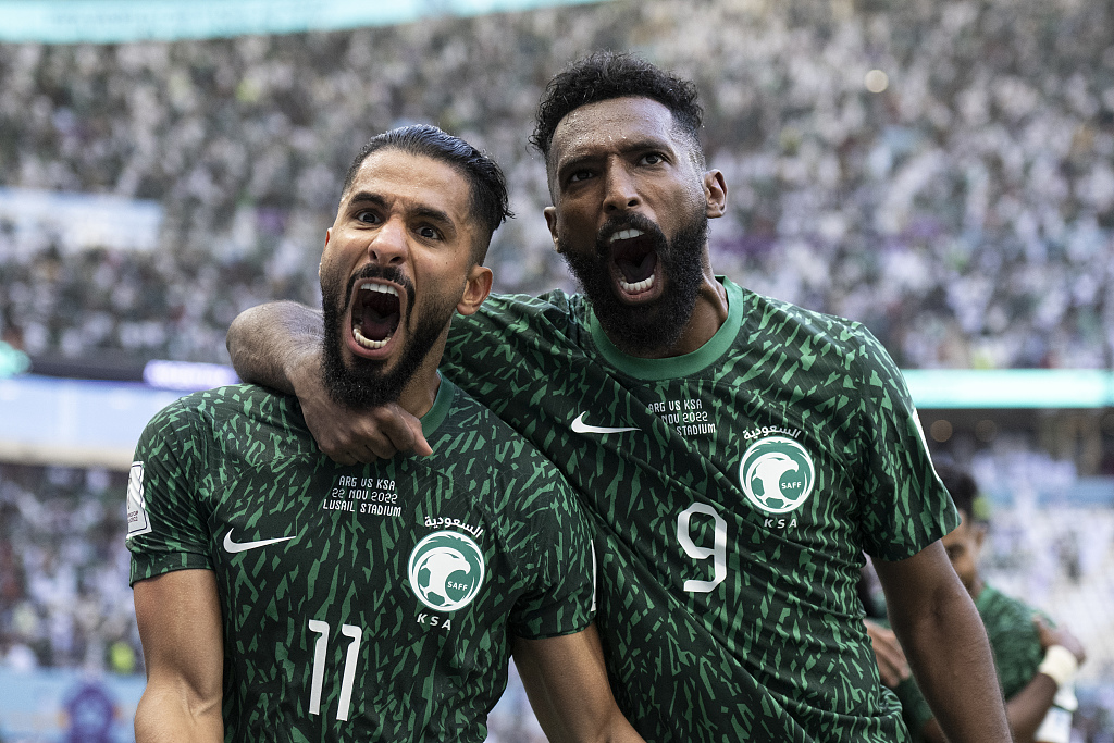 Players of Saudi Arabia celebrate after scoring a goal in the FIFA World Cup game against Argentina at Lusail Stadium in Qatar, November 22, 2022. /CFP