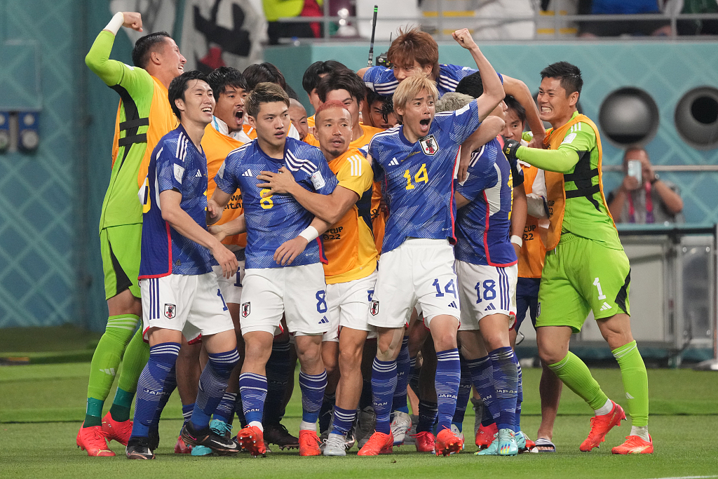Japan's players celebrate during the FIFA World Cup game against Germany at Khalifa International Stadium in Doha, Qatar, November 23, 2022. /CFP