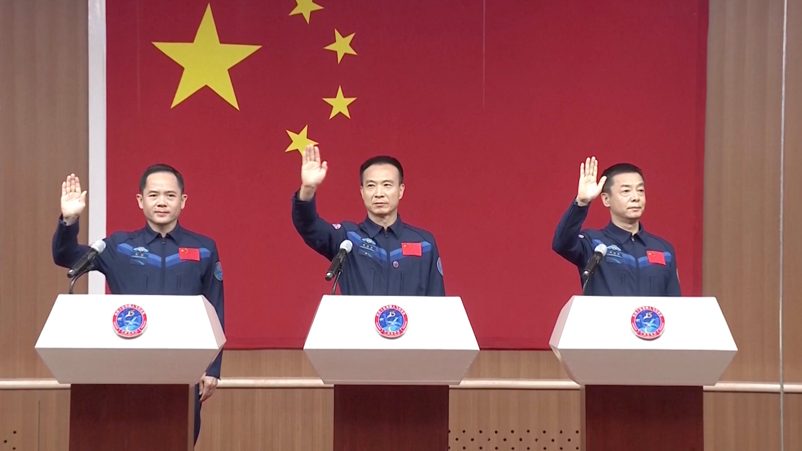 L-R: Zhang Lu (operator), Fei Junlong (commander), and Deng Qingming (operator), the crew members of China's Shenzhou-15 mission, meet the press, November 28, 2022. /CMSA