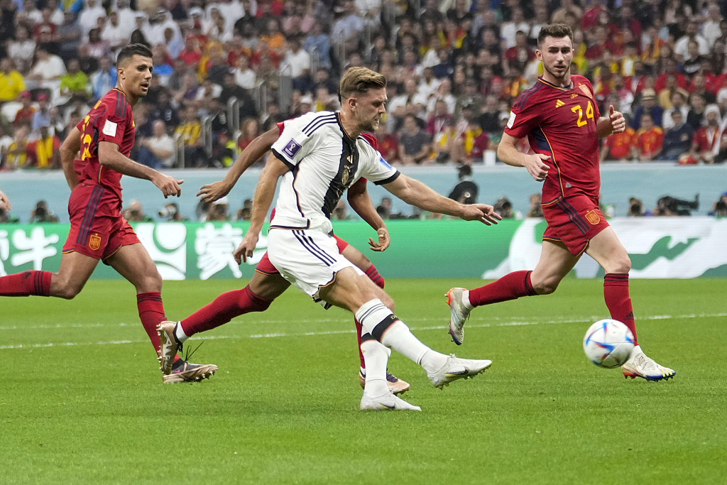 Niclas Fuellkrug (C) of Germany scores a wonder goal during their World Cup clash with Spain at Al Bayt Stadium in Al Khor, Qatar, November 27, 2022. /CFP