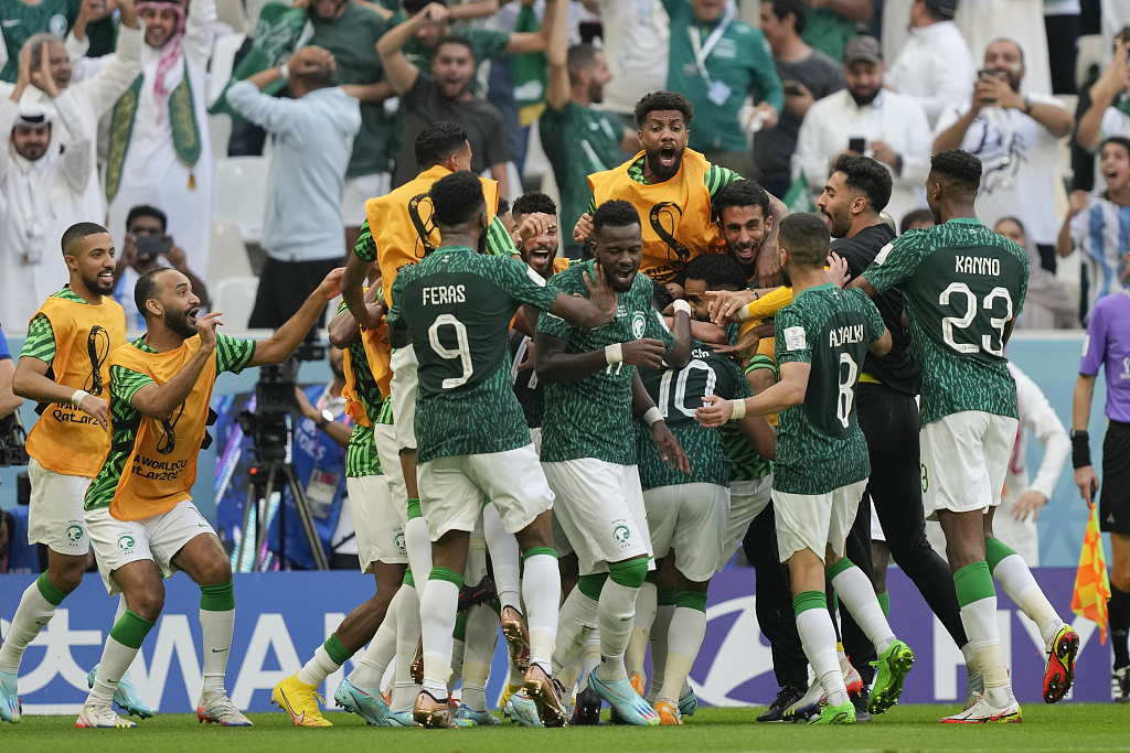 Saudi Arabia's players celebrate after scoring a goal in the FIFA World Cup game against Argentina at the Lusail Stadium in Qatar, November 22, 2022. /CFP