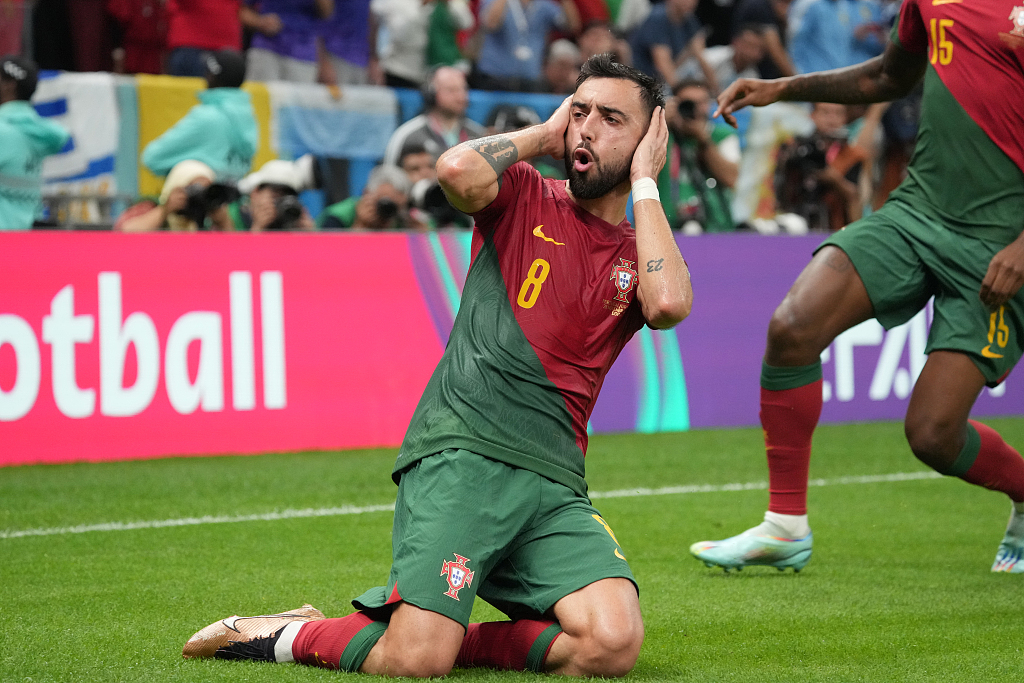 Bruno Fernandes (#8) of Portugal celebrates after scoring a goal in the FIFA World Cup game against Uruguay at Lusail Stadium in Qatar, November 28, 2022. /CFP