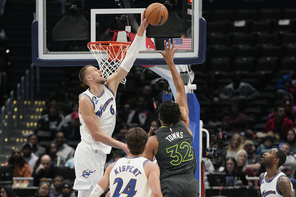 Kristaps Porzingis (#6) of the Washington Wizards blocks a shot by Karl-Anthony Towns (#32) of the Minnesota Timberwolves in the game at Capital One Arena in Washington, D.C., November 28, 2022. /CFP
