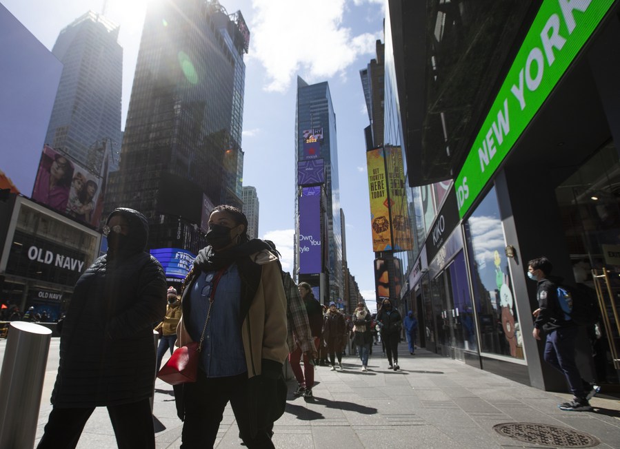 People walk on Times Square in New York, the United States, March 29, 2022. /Xinhua