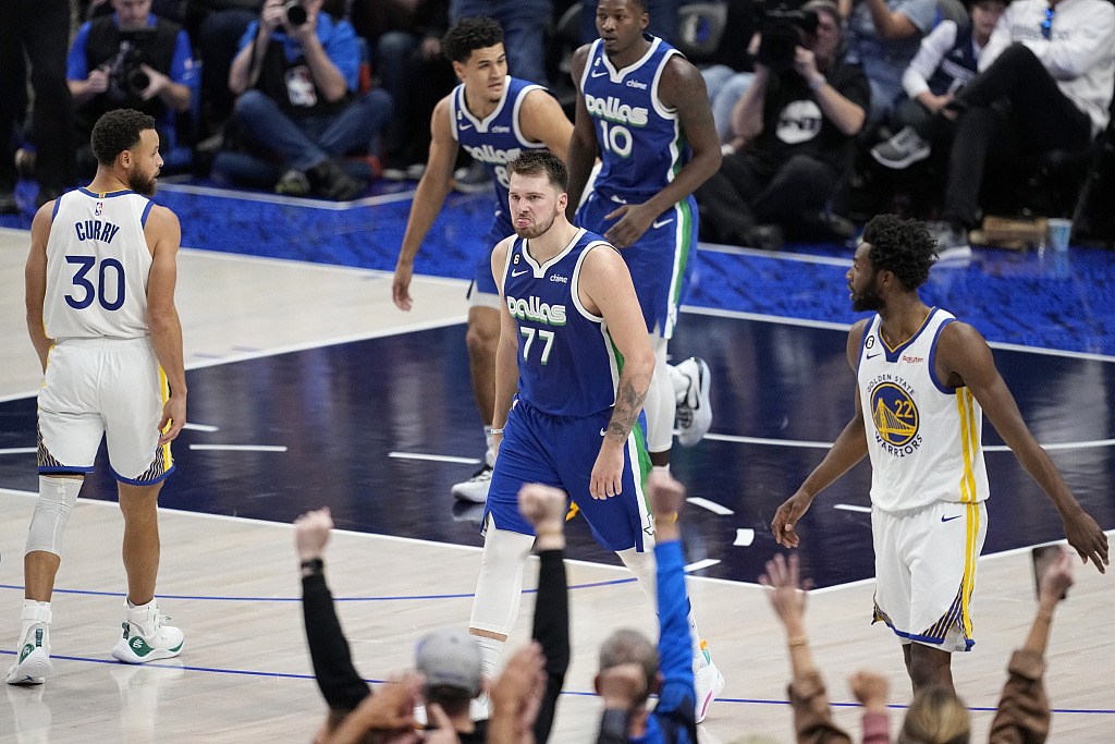 Luka Doncic (#77) of the Dallas Mavericks looks on in the game against the Golden State Warriors at American Airlines Center in Dallas, Texas, November 29, 2022. /CFP