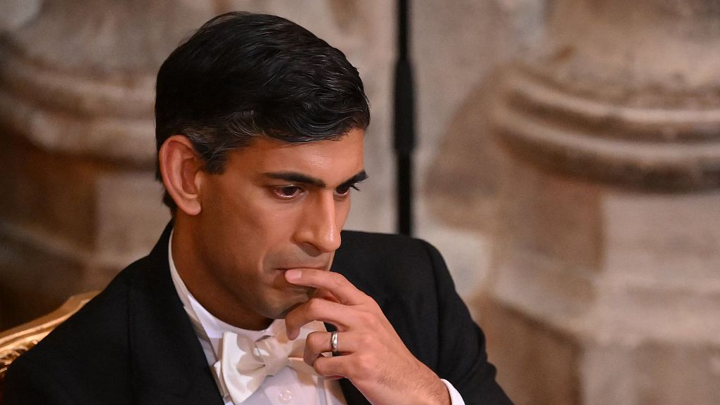 Britain's Prime Minister Rishi Sunak listens to a speaker during the Lord Mayor's Banquet at Guildhall in central London on November 28, 2022. /CFP