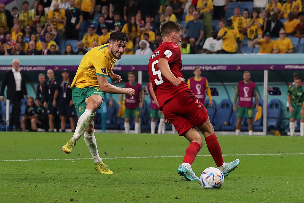 Mathew Leckie of Australia fires the ball past Kasper Schmeichel of Denmark to give his side a 1-0 win over Denmark at Al Janoub Stadium in Doha, Qatar, November 30, 2022. /CFP