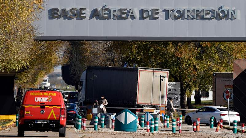 Military police stand guard at the main entrance of the Spanish air force base after Spain's security forces found a 