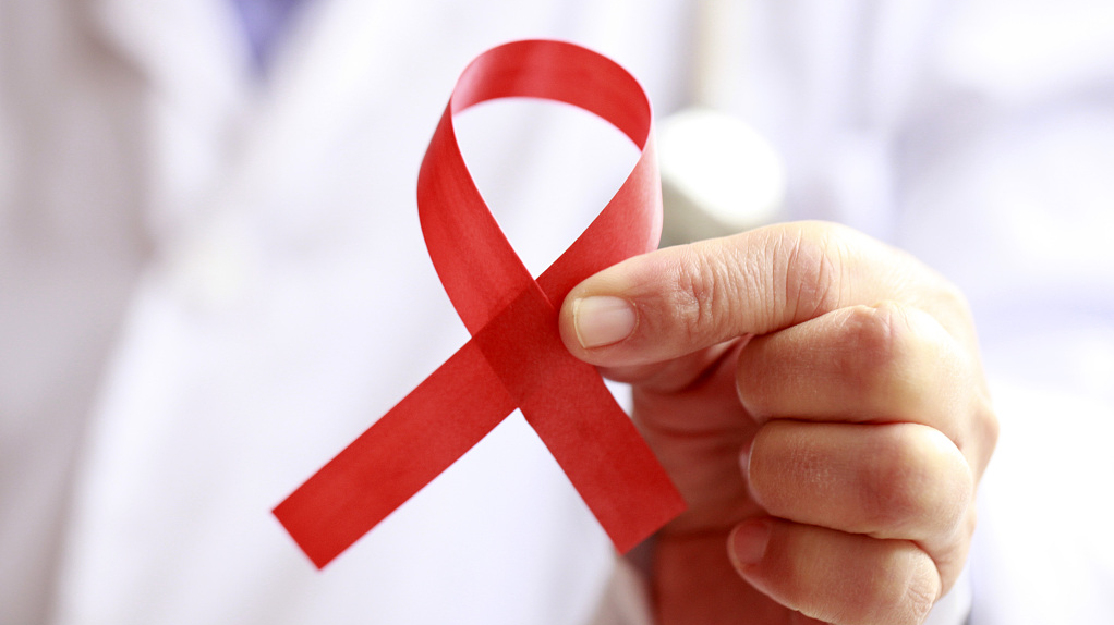 The red ribbon, a universal symbol of awareness and support for people living with HIV. /CFP
