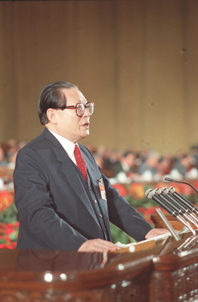 Jiang Zemin delivers a report at the 14th CPC National Congress in Beijing, October 12, 1992. /Xinhua