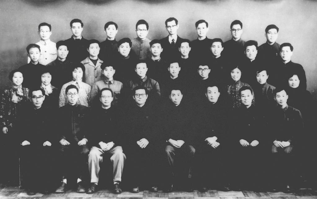Jiang Zemin (5th R, front row) with members of a leading group of technicians in charge of work on the design of small, three-phase, asynchronous motors, March 1963. /Xinhua