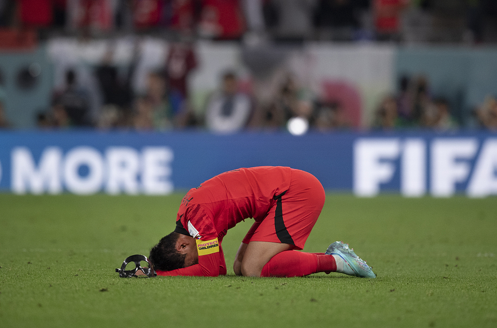 Son Heung-min reacts after his South Korean team won the 2022 World Cup Group H match against Portugal in Al Rayyan, Qatar, December 2, 2022. /CFP

