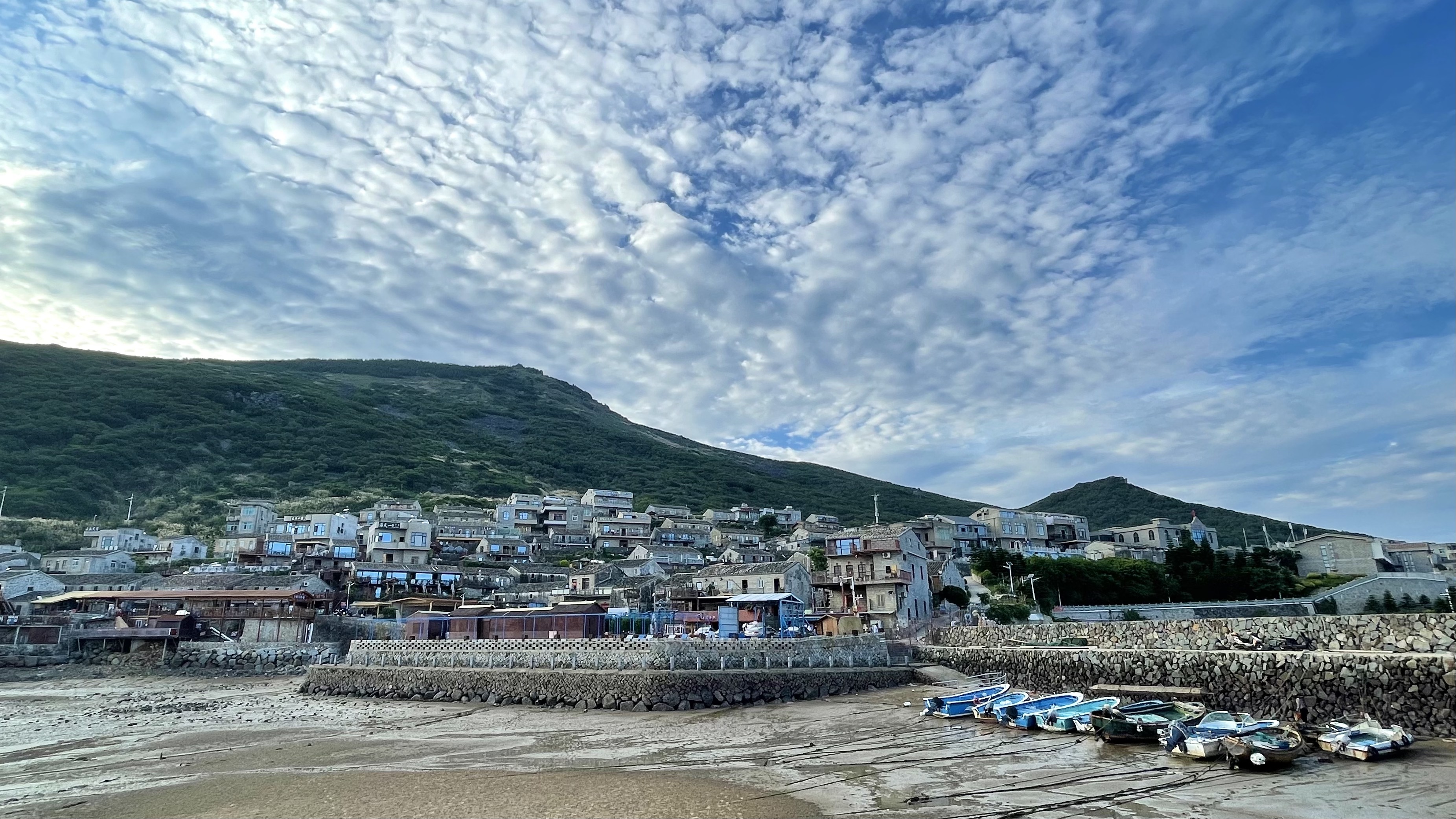 Beigang Village is a historic fishing village situated on Pingtan Island's northeastern corner, where old stone masonry buildings stand close to each other on a hillside by the sea, in Fujian Province, southeast China. Hong Yaobin/CGTN