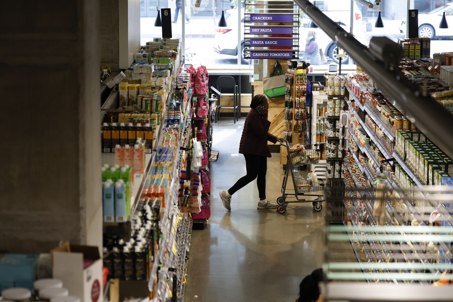 A customer shops at a supermarket in Washington, D.C., the United States, on Oct. 28, 2022. /Xinhua