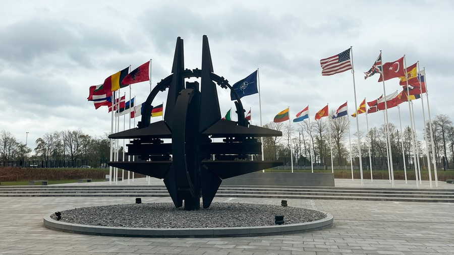 A sculpture and flags at NATO headquarters in Brussels, Belgium, April 6, 2022. /CFP