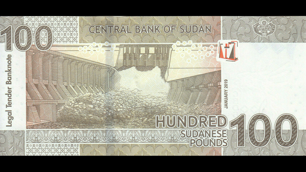 100 Sudanese pound banknote shows the image of Merowe Dam, Roseires Dam and the Dam Complex of Upper Athara Project built by Chinese companies in Sudan. /Shen Shiwei