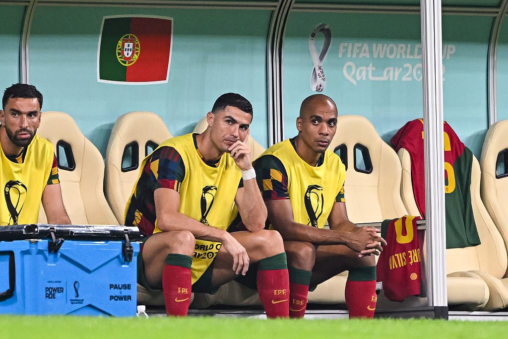 Cristiano Ronaldo (C) of Portugal appears dejected on the bench during the World Cup clash with Switzerland at Lusail Stadium in Lusail City, Qatar, December 6, 2022. /CFP