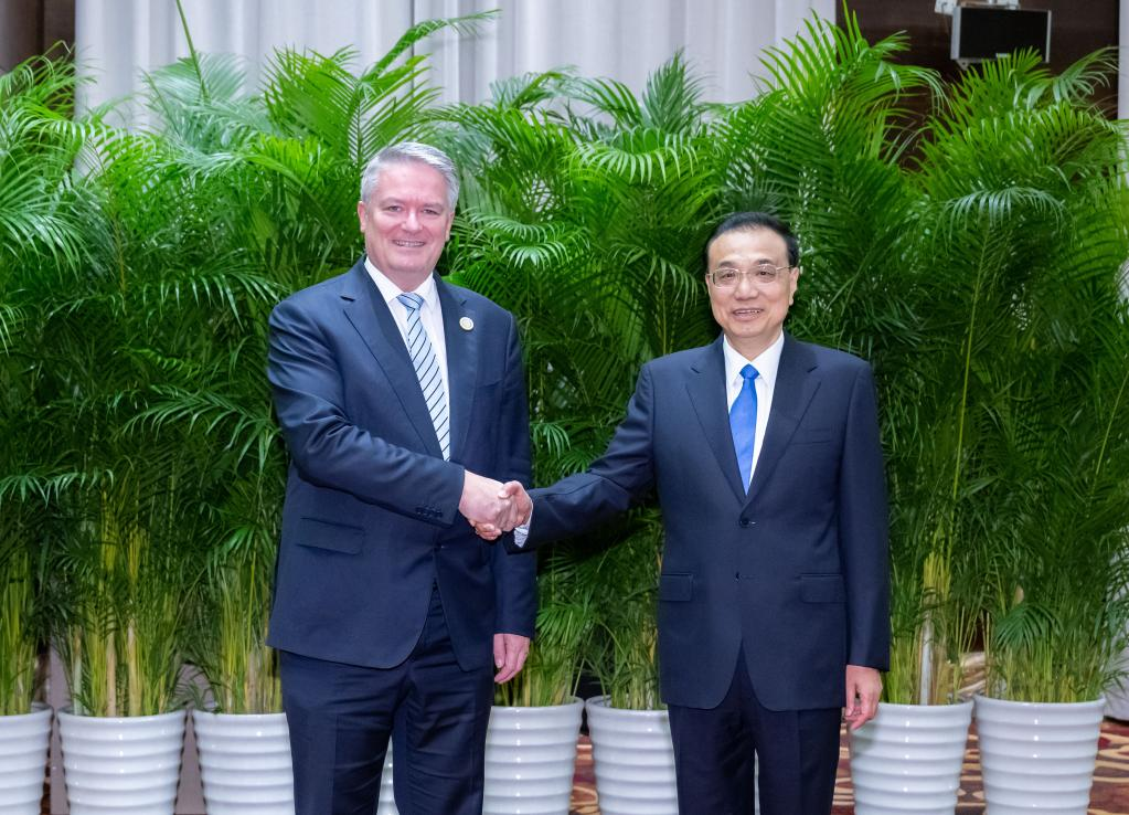 Li meets with Secretary-General of the OECD Mathias Cormann during the seventh 