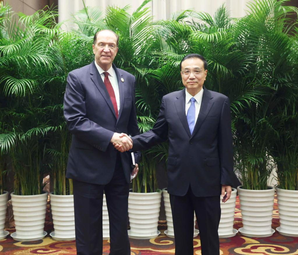 Chinese Premier Li Keqiang meets with President of the World Bank Group David Malpass during the seventh 