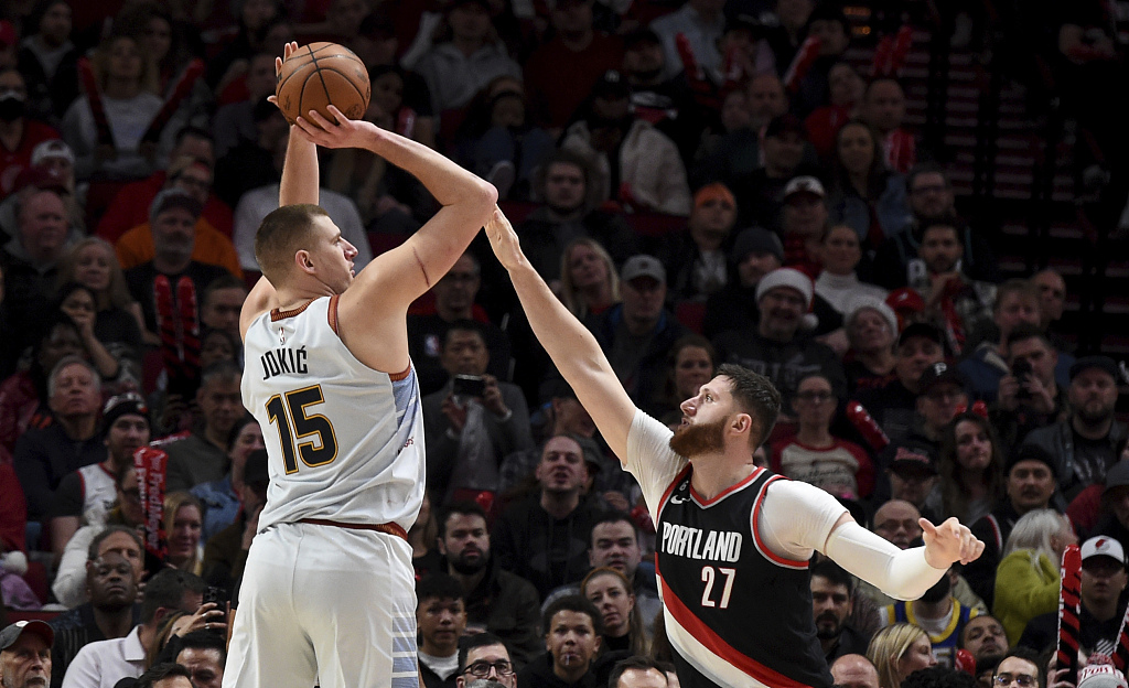 Nikola Jokic (#15) of the Denver Nuggets shoots in the game against the Portland Trail Blazers at Moda Center in Portland, Oregon, December 8, 2022. /CFP