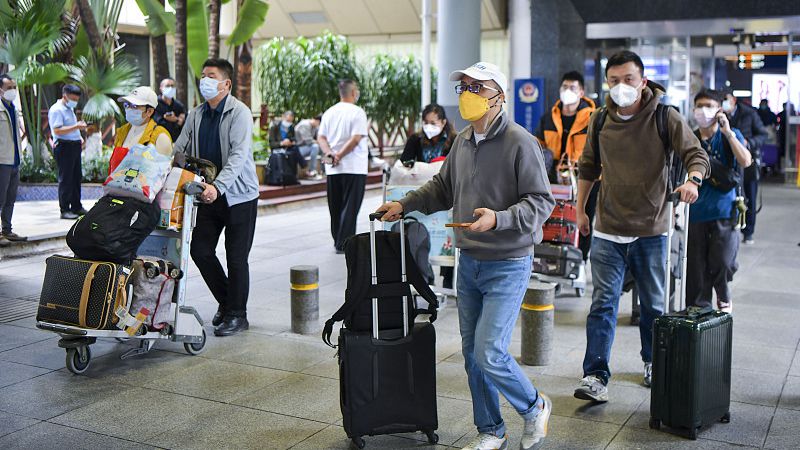Travelers arrive at Haikou Meilan International Airport, south China's Hainan Province, December 9, 2022. /CFP