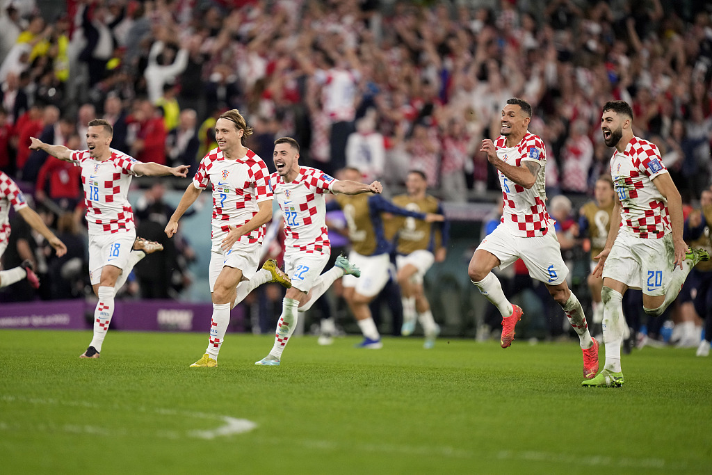 Croatian players celebrate after defeating Brazil in the World Cup quarterfinal round in Al Rayyan, Qatar, December 9, 2022. /CFP