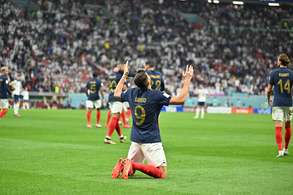 France's Olivier Giroud #9 celebrates after scoring his team's second goal during the World Cup quarterfinal match against England in Al Khor, Qatar, December 10, 2022. /CFP