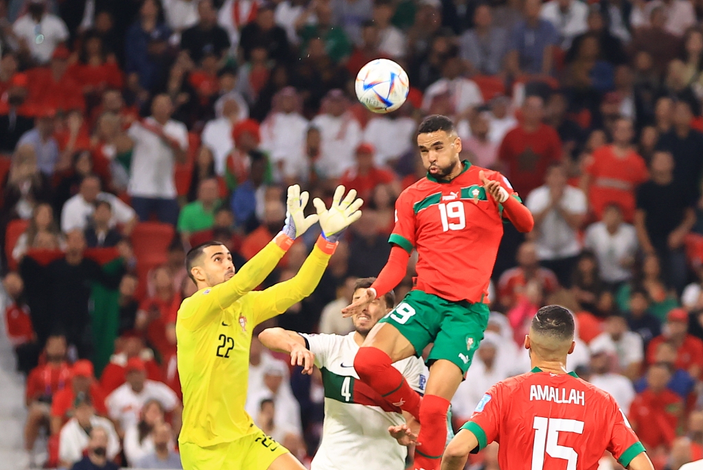 Youssef En-Nesyri #19 of Morocco scores a goal during the World Cup quarterfinal match against Portugal in Doha, Qatar, December 10, 2022. /CFP
