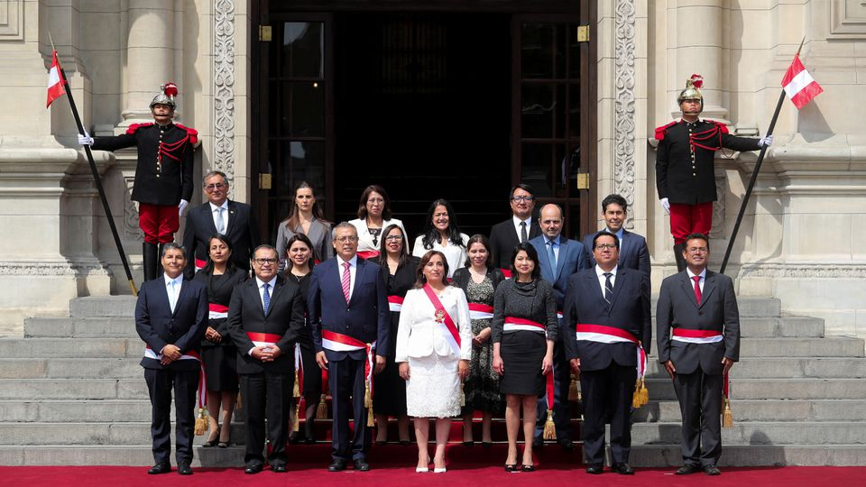 Peru's President Dina Boluarte (C) poses along with her new cabinet in Lima, Peru December 10, 2022. /Reuters