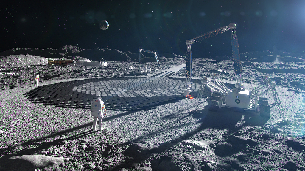 An imaginary illustration of human beings working on a lunar base. /CFP