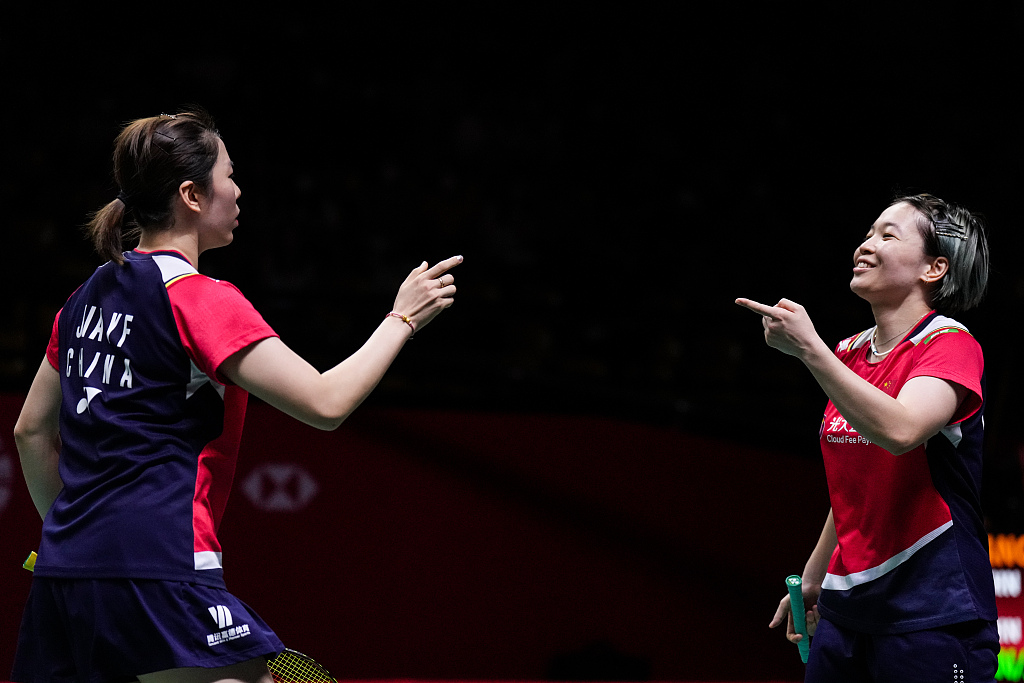 Chen Qingchen (R) and Jia Yifan of China react in the women's doubles semi-final at the BWF World Tour Finals in Bangkok, Thailand, December 10, 2022. /CFP