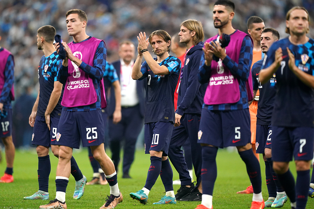 Luka Modric (#10) is pictured among the players of Croatia gesturing to the audience after losing to Argentina in the World Cup semifinal round in Lusail City, Qatar, December 13, 2022. /CFP