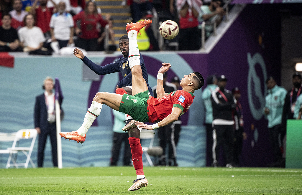 Jawad El Yamiq of Morocco shoots in the FIFA World Cup semifinals against France at Al Bayt Stadium in Qatar, December 14, 2022. /CFP
