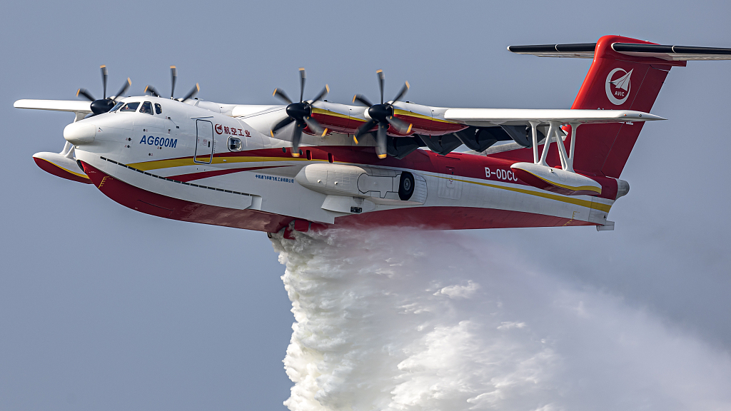 An AG600M aircraft demonstrates its water-dropping function at the 14th China International Aviation and Aerospace Exhibition in Zhuhai City, south China's Guangdong Province, November 9, 2022. /CFP