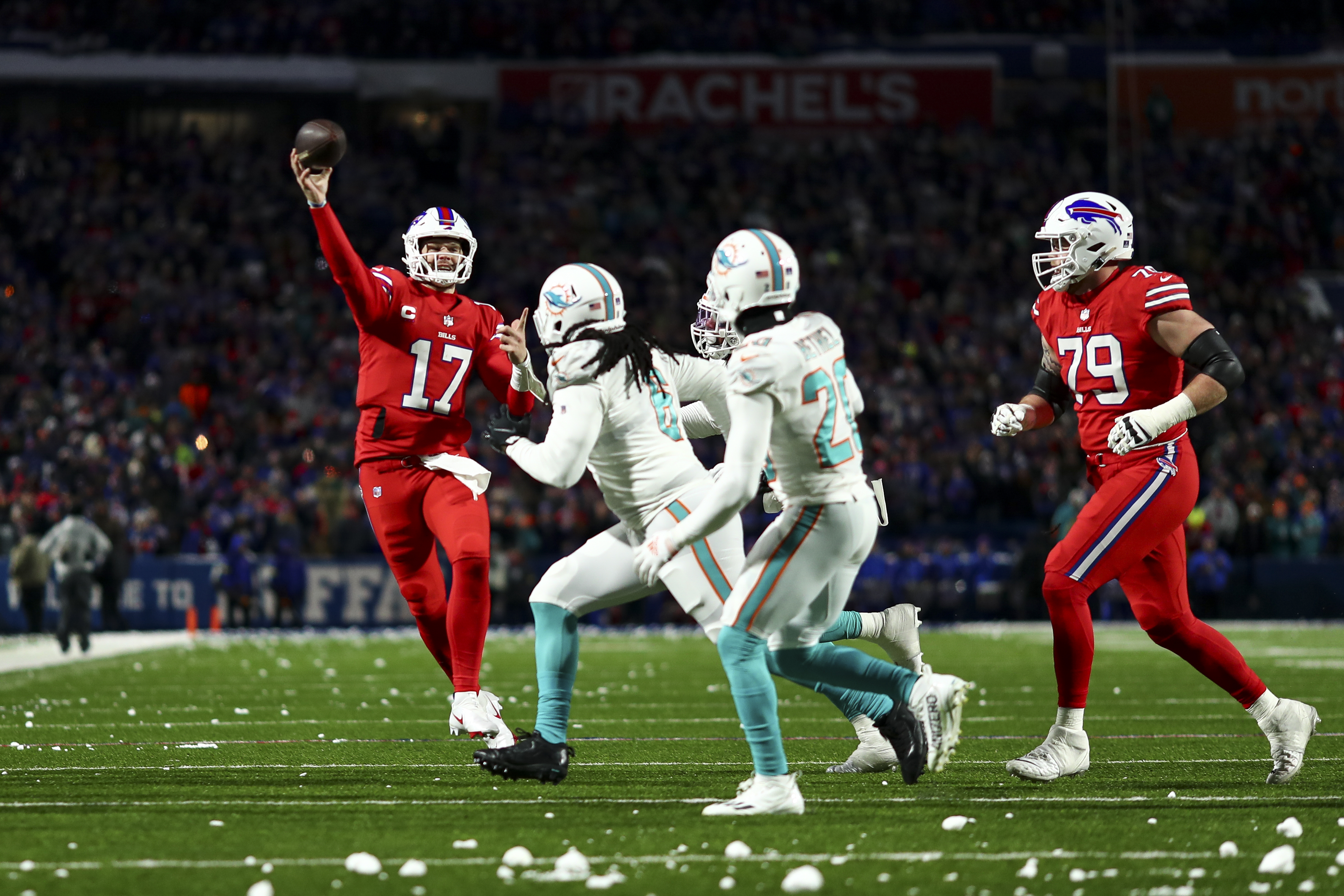 Quarterback Josh Allen (#17) of the Buffalo Bills passes in the game against the Miami Dolphins at Highmark Stadium in Orchard Park, New York, December 17, 2022. /CFP