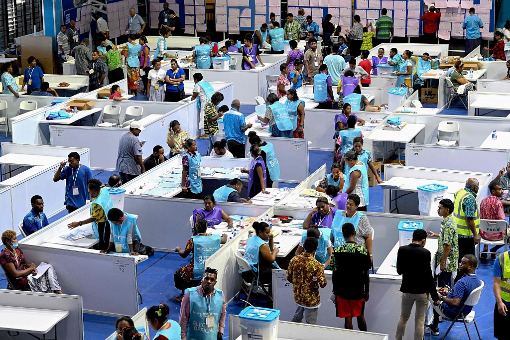 Staff of the election office and scrutineers are seen at the Fijian Elections Office National Count Center in Suva, Fiji, December 15, 2022. /CFP