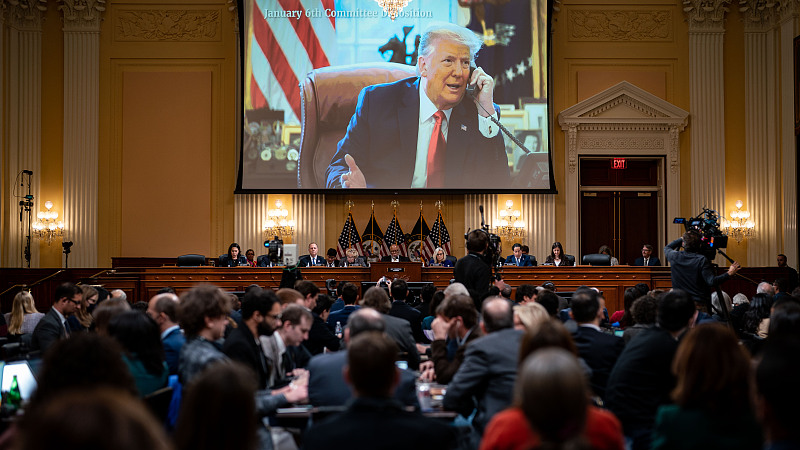 An image of President Donald Trump is displayed on a screen as the U.S. House select committee to investigate the January 6th Capitol riot conducts its final hearing in the Cannon House Office Building in Washington, D.C., December 19, 2022. /CFP